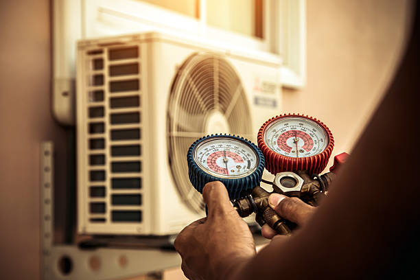 Professional Ductwork Repair technician working in Valley Falls, RI